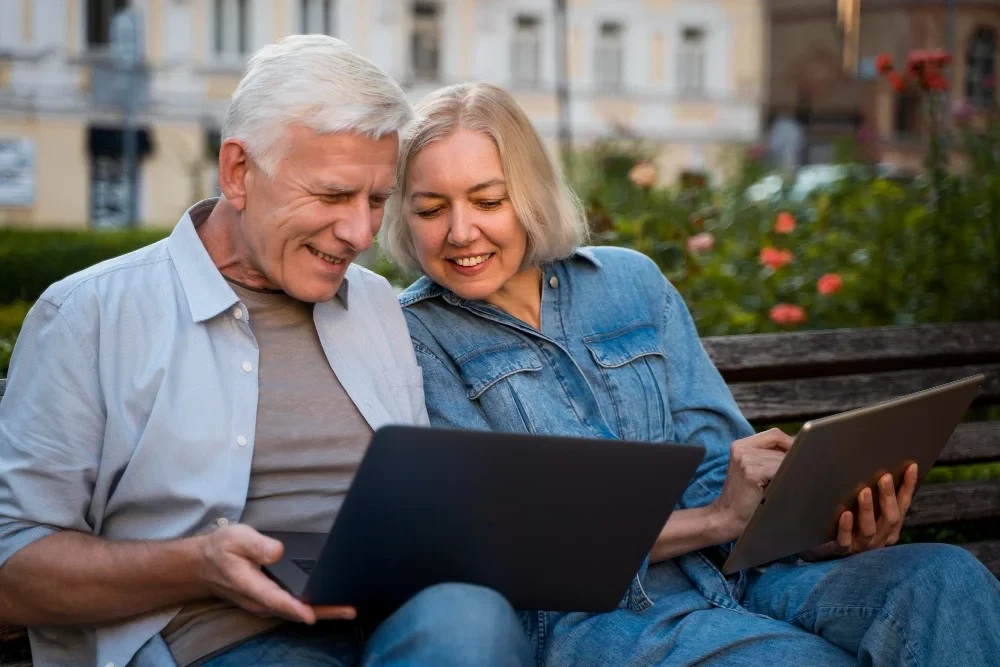 Immigration attorney consulting with elderly parents about family immigration options